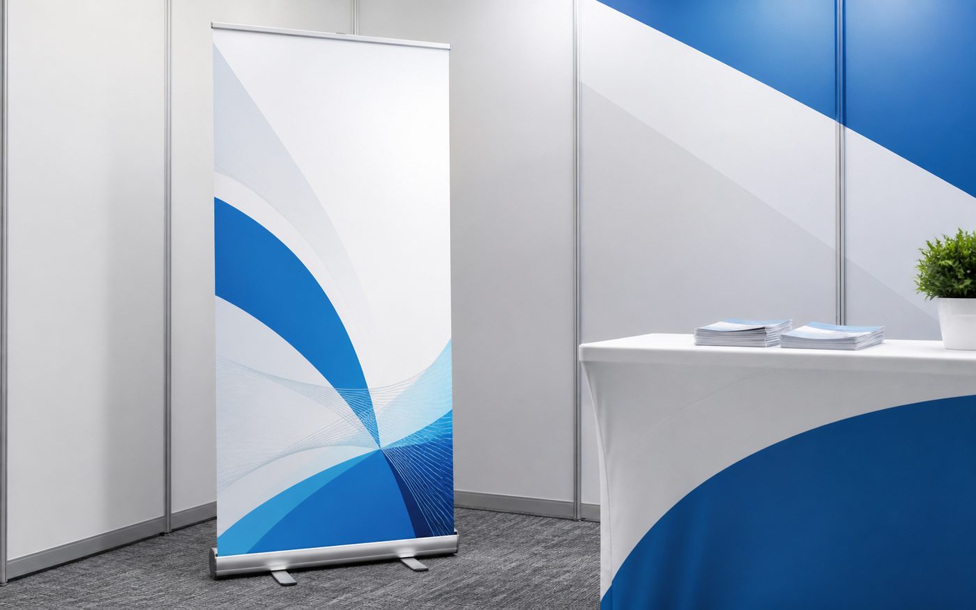 Retractable banner stand next to a clean branded event table
